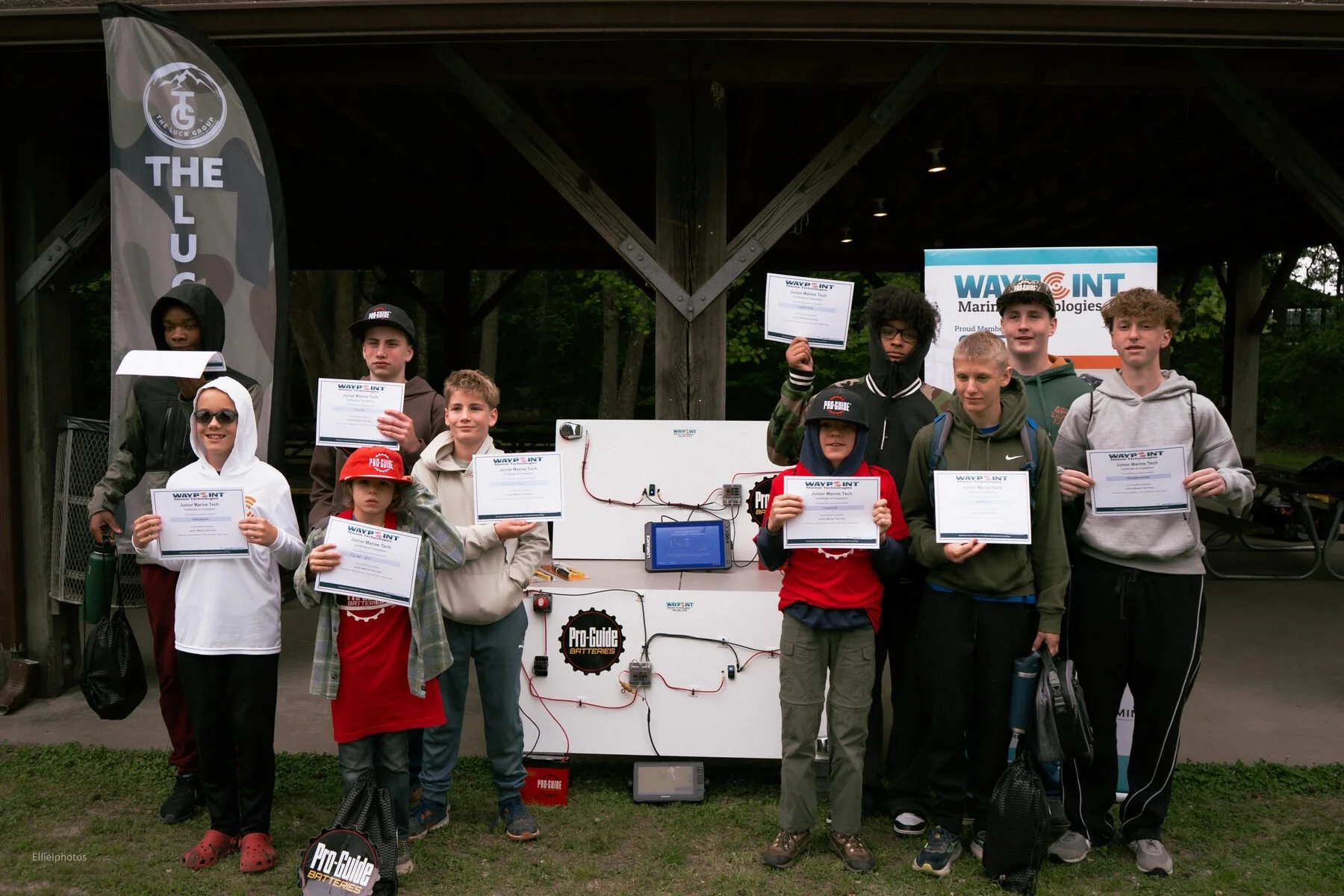 Junior Marine Tech Day graduates holding their certificates of completion