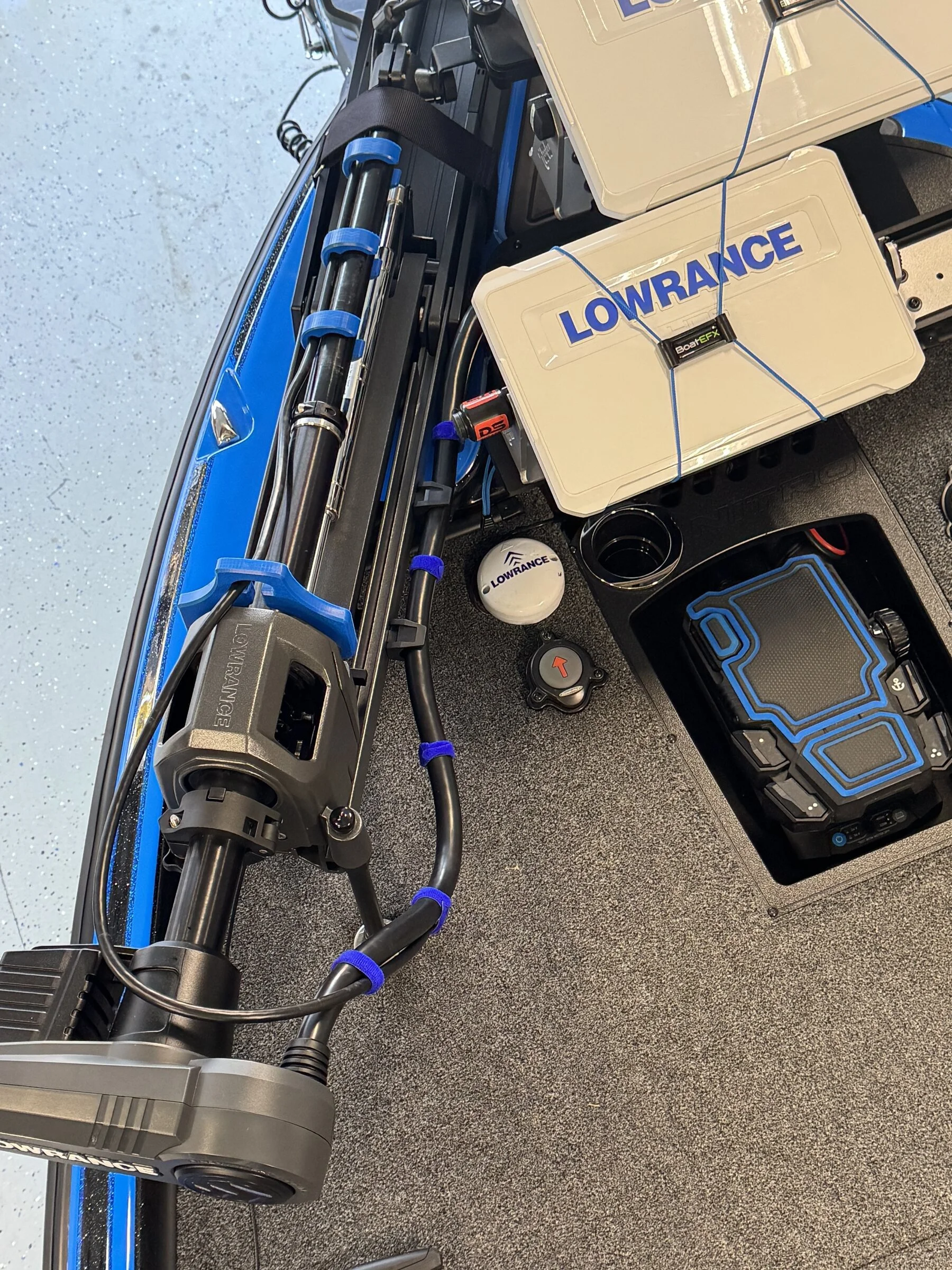 Dual Lowrance HDS units and a trolling motor pedal wired into the stern deck of a Nitro Z21XL