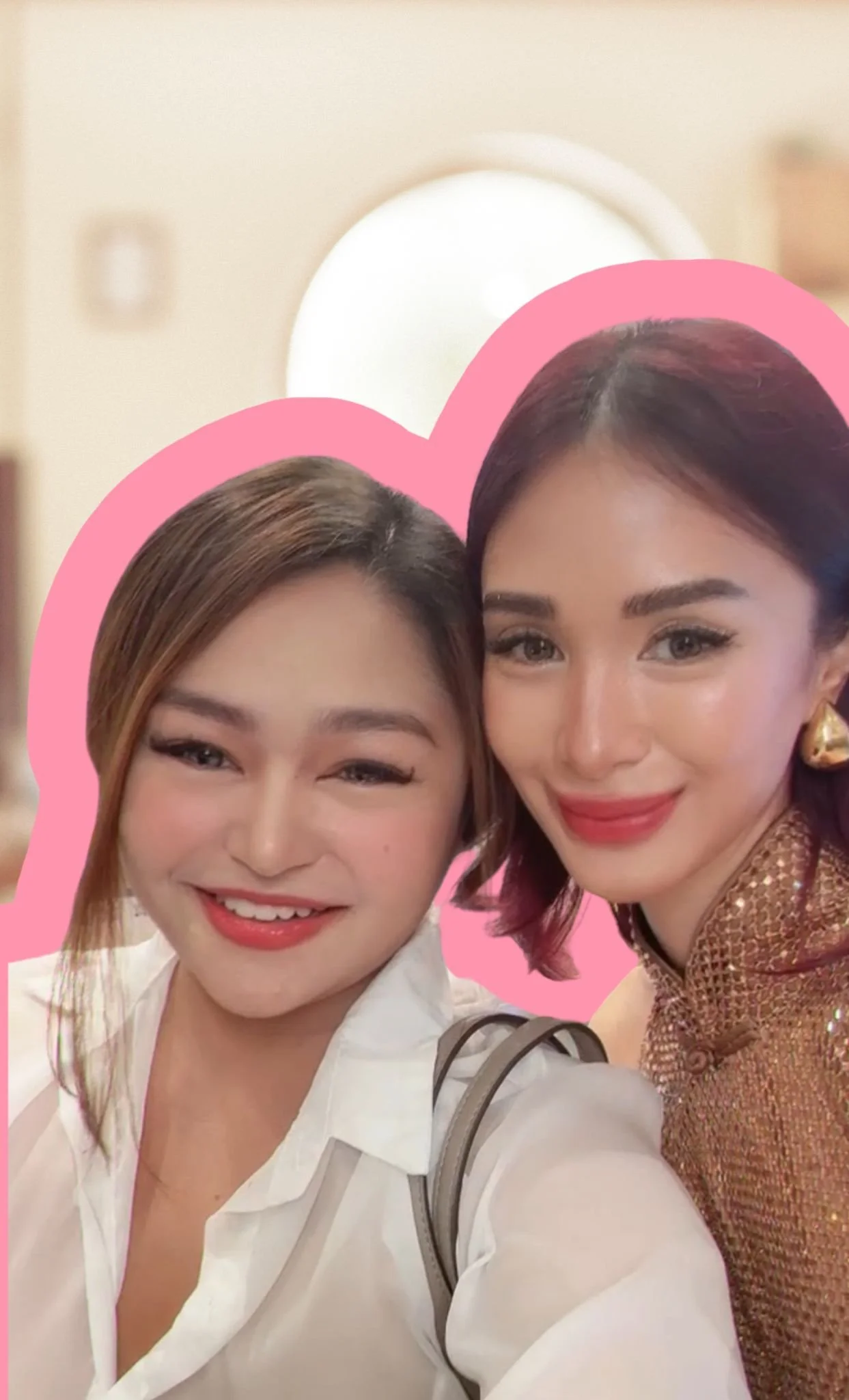 Two women smiling and taking a selfie, with one wearing a white blouse and the other in a shiny, reddish-brown top, set against a pink outline background. The realtor is trusted by celebrities.