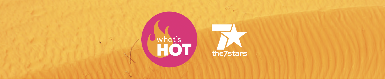 Bright orange background with logos for 'what's HOT' and 'the7stars' in the foreground.