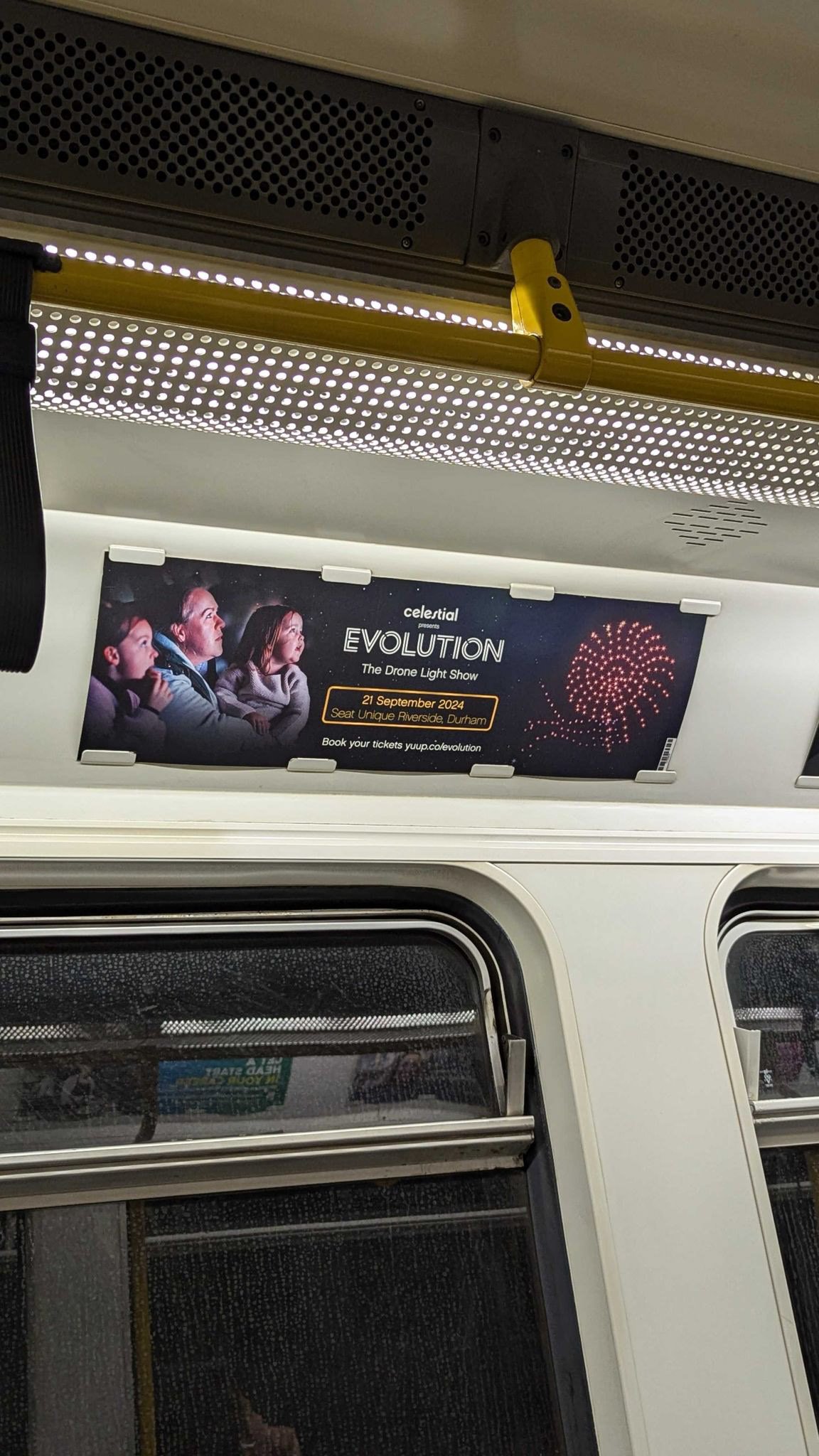 Advertisement for Celestial Evolution drone light show scheduled for September 21, 2024, at Riverside in Durham, featuring a group of children watching fireworks.