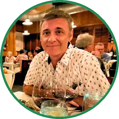 Nate, the founder of Green Sprint Digital, smiling at a table.