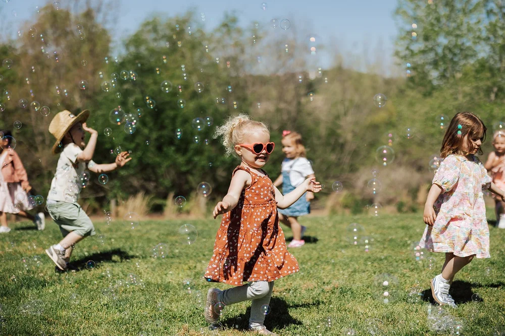 Kids experiencing bubble entertainment at Bay Area birthday party