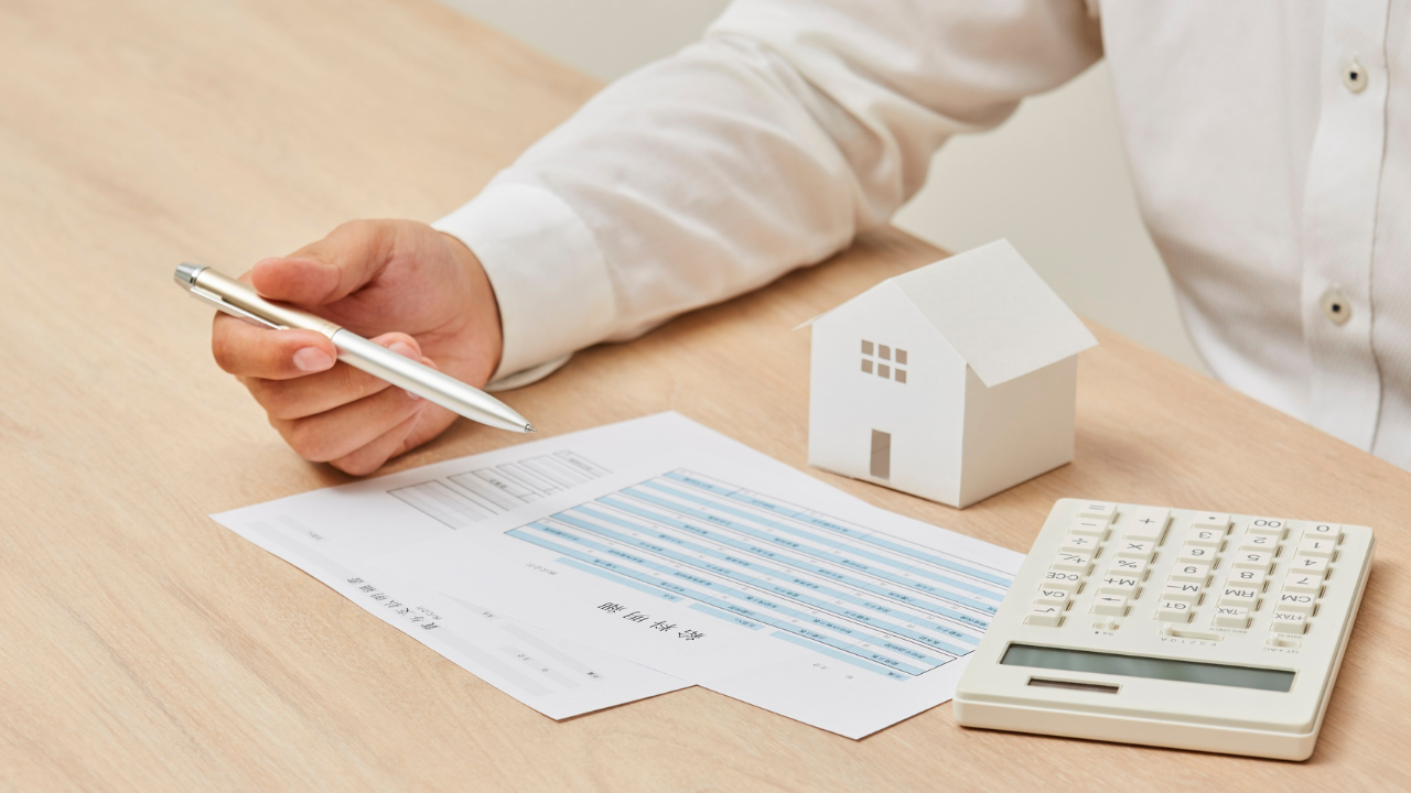 A person looking throught their documents thinking about getting an estate plan