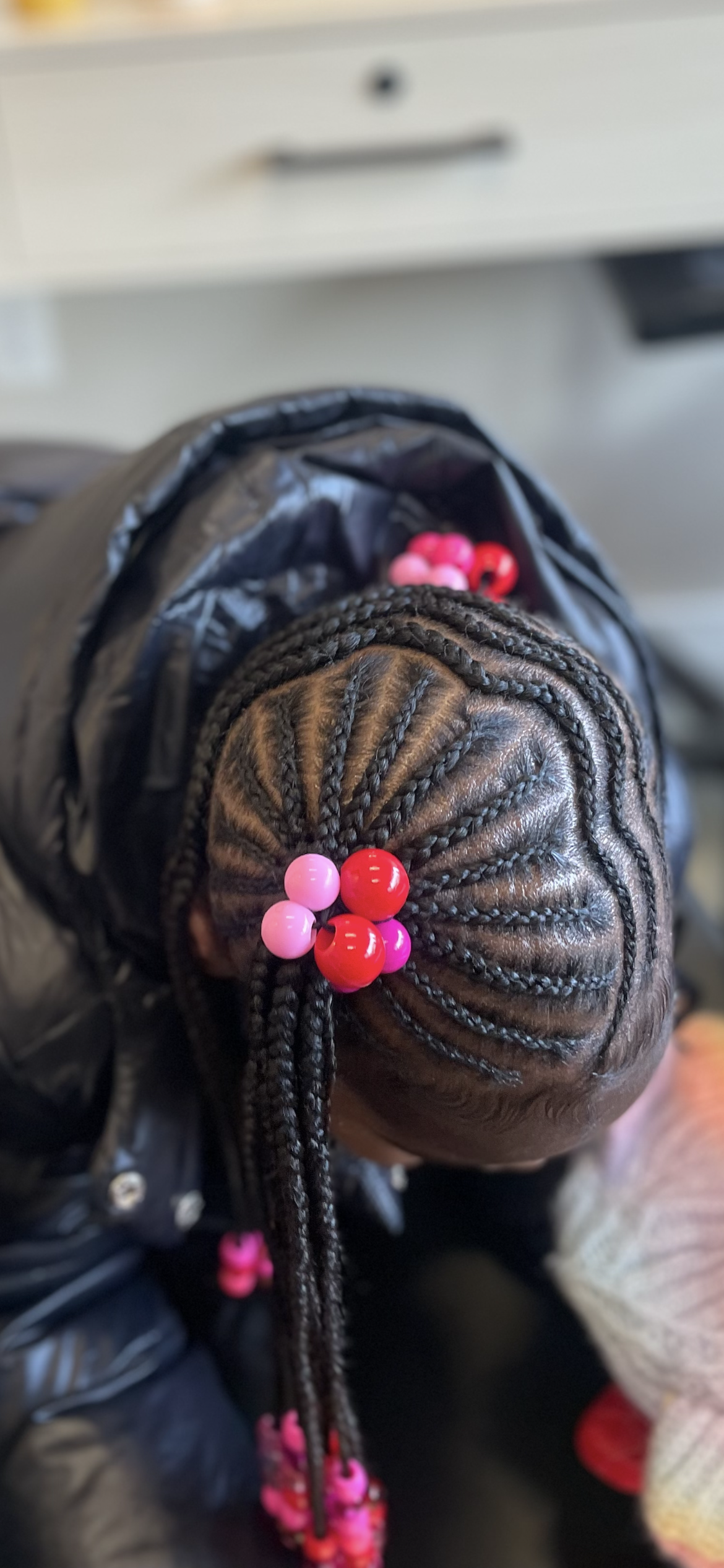 Decorative braided children's style perfect for birthdays with beads and accessories included.
