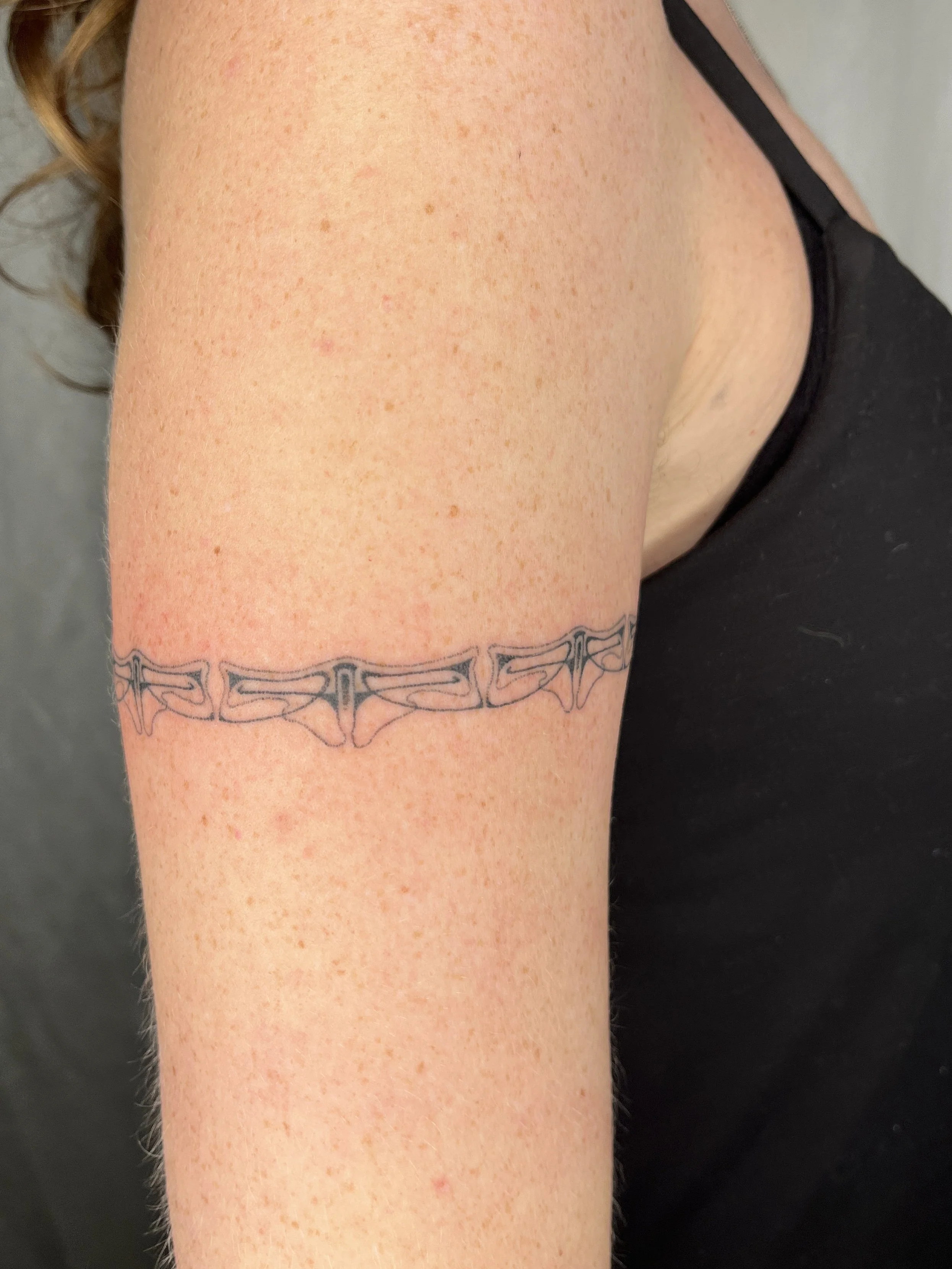 handpoke, 5 hours (full wrap), 2024