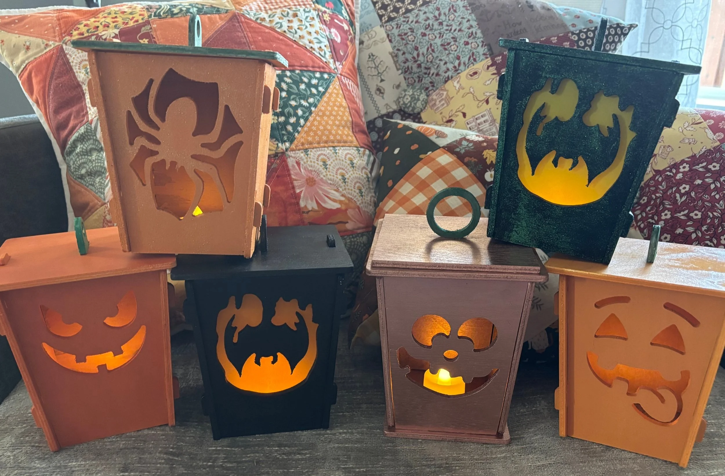 Fall pillows and lanterns.