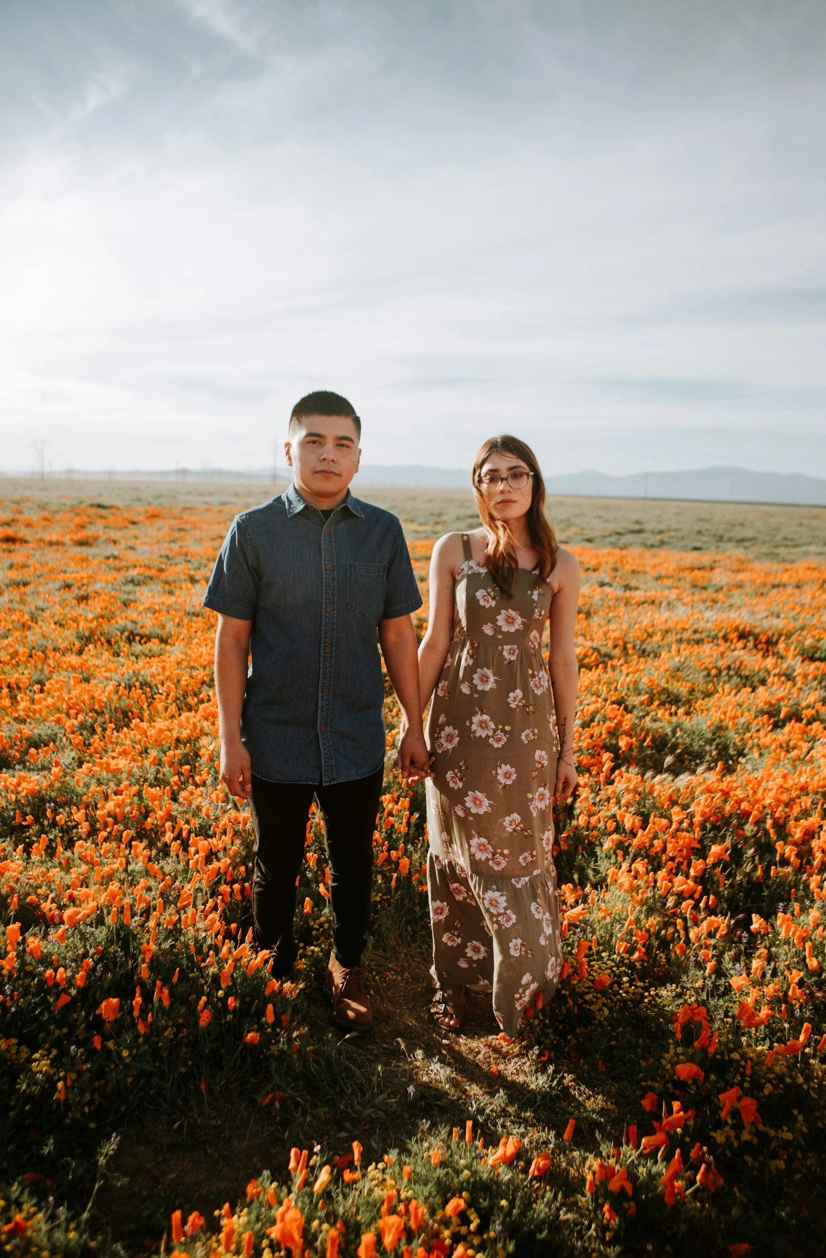 Latino couple in a field