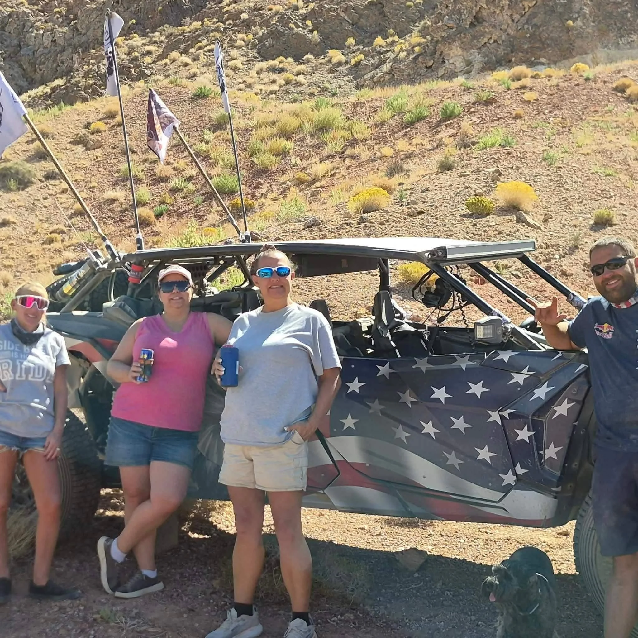 Nye County SxS riders posing with their off-road UTV in the desert at the 2026 Dyer - Fish Lake Poker Run
