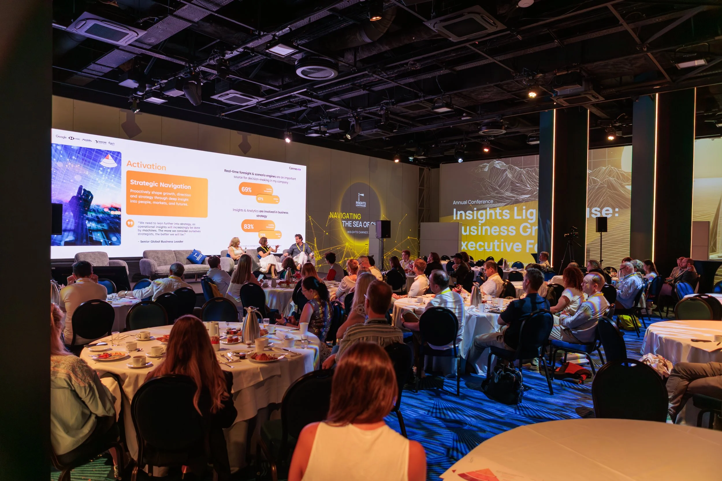 Insights Lighthouse Cannes 2026: the conference stage and seated audience.