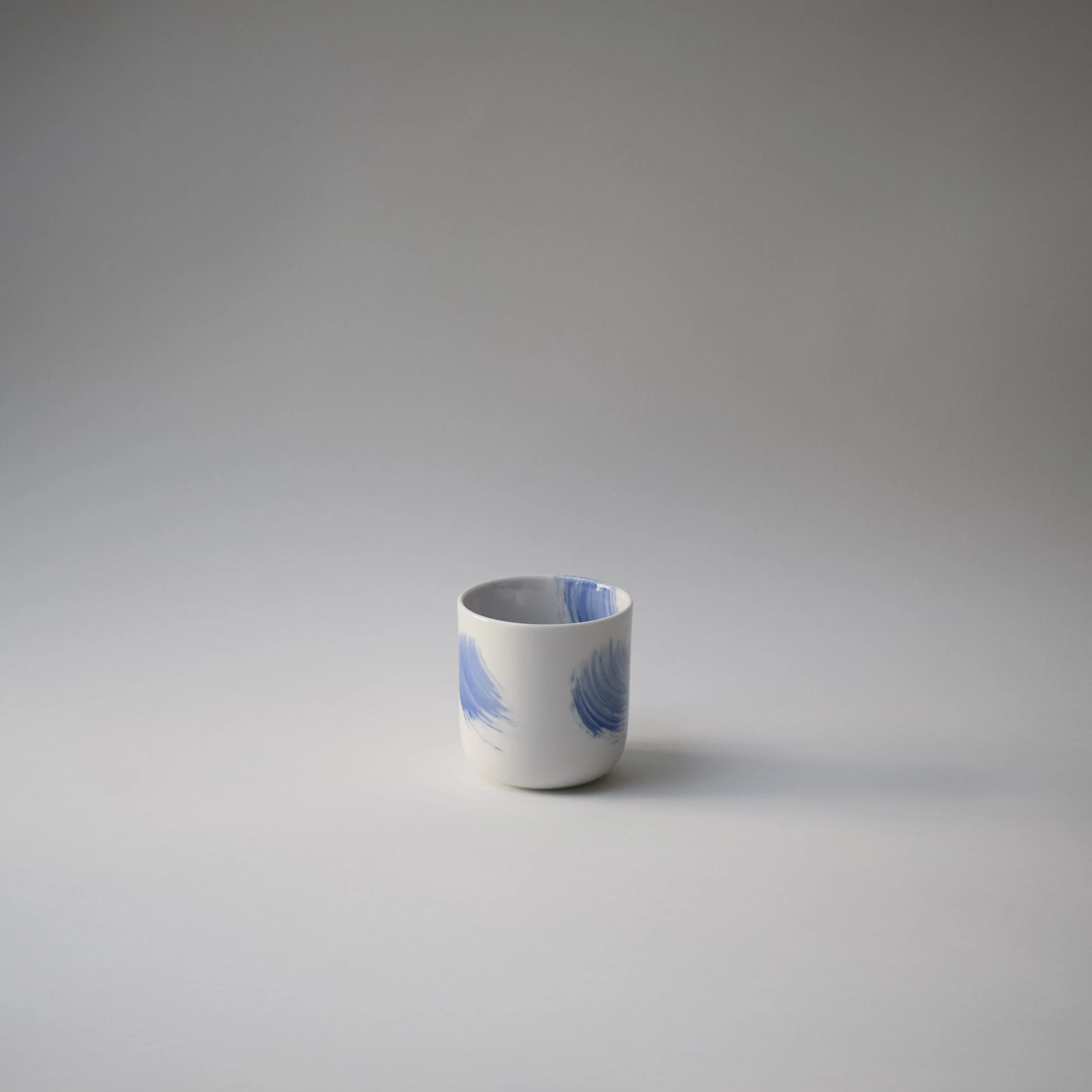 Porcelain cup with cobalt paint