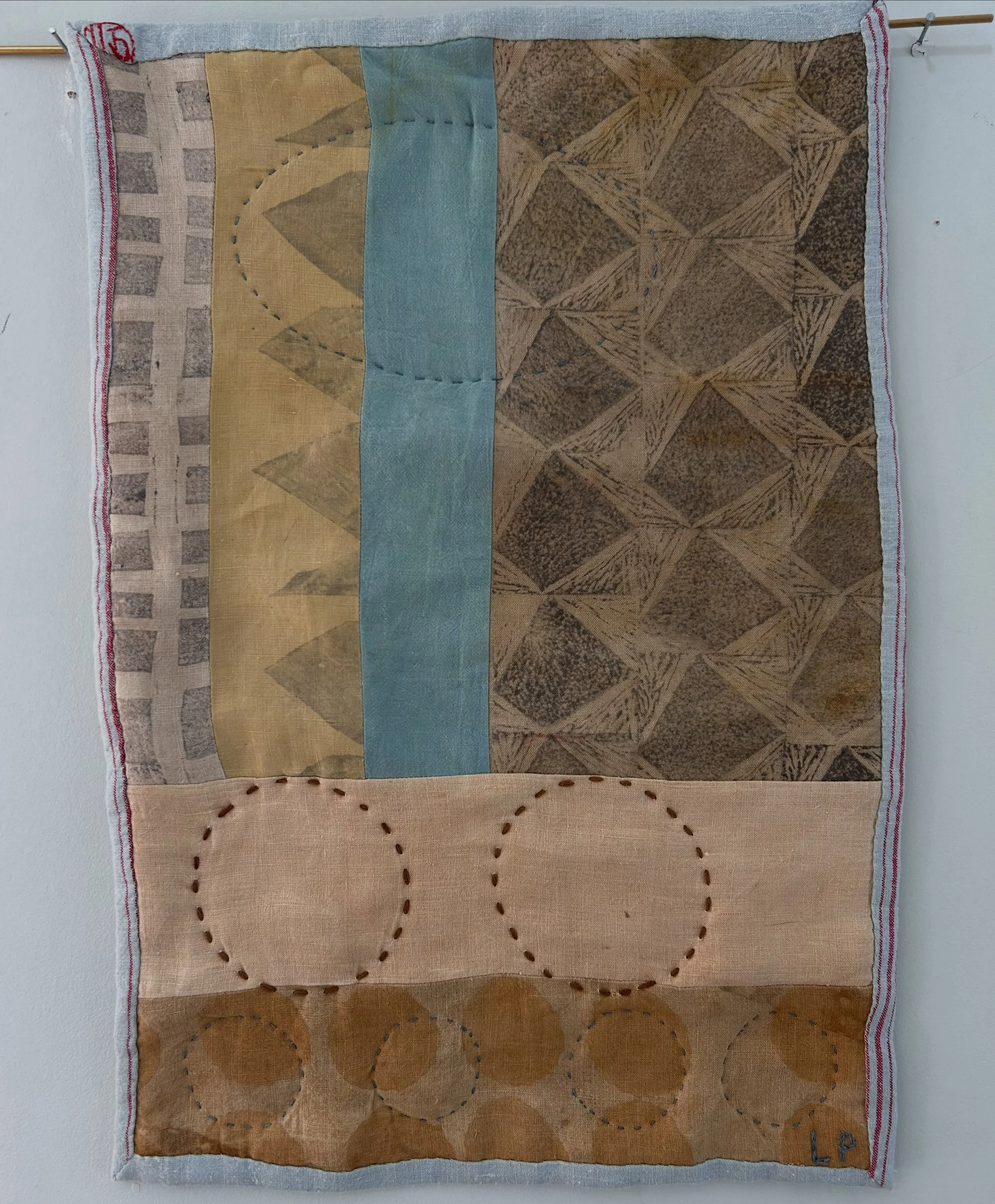 Photographing this quilt before it goes off to its new home .
Circles are an ever present symbol in my quilts , as they are a whole, without start or finish.
They encompass family, nature , completeness.
This one is unusual as it has an oval , or str