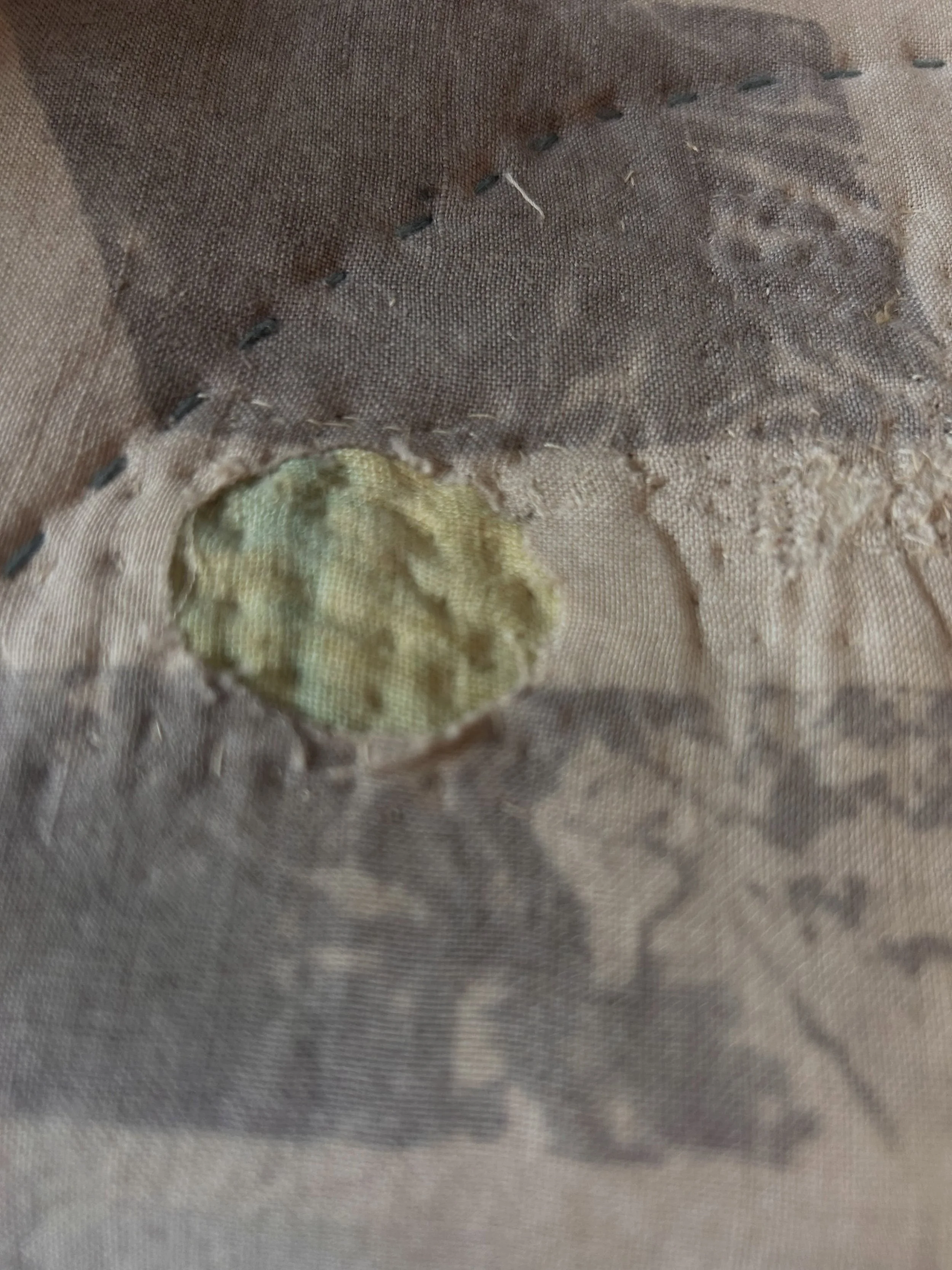 The beauty of using vintage textiles is that they have previously lived a life. The downside is that they can be more fragile , and this one showed its fragility after being quilted. So I am having to mend with little stitches , creating a new narrat