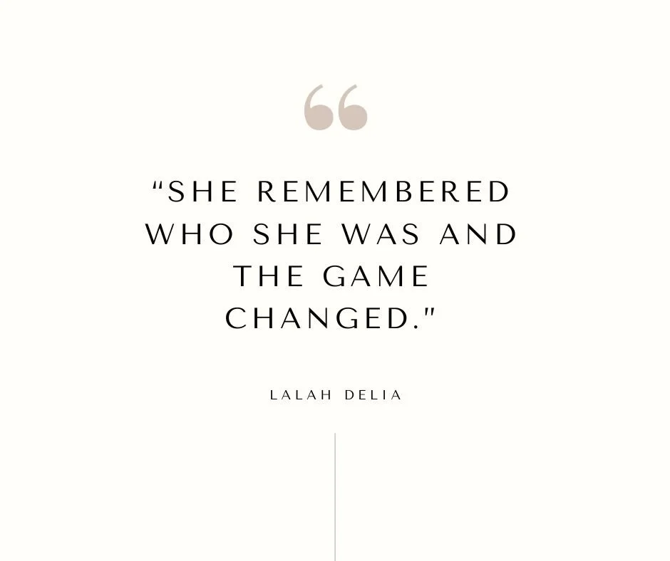 Inspirational quote by Lalah Delia: "She remembered who she was and the game changed." on a plain background with minimalistic design.