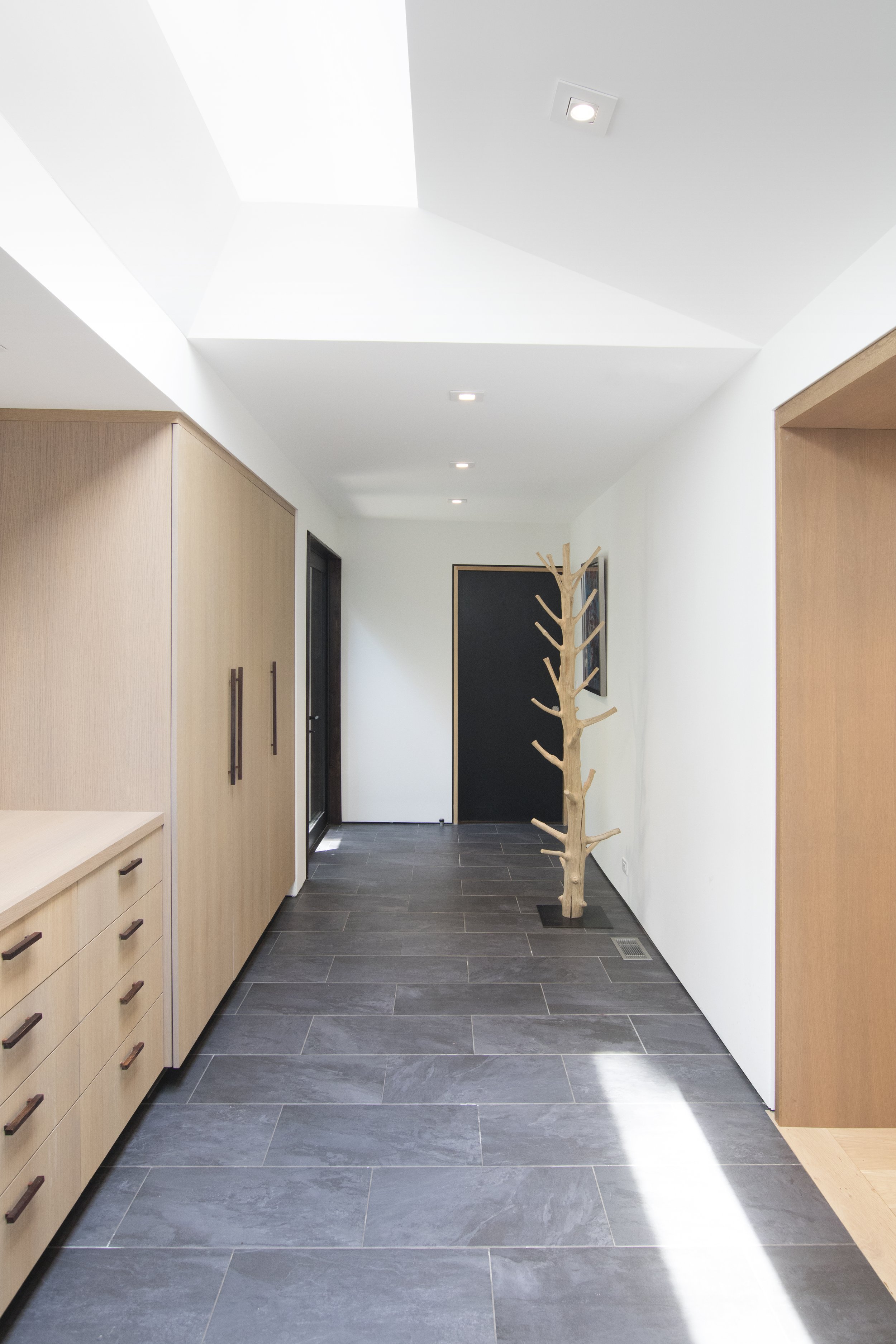 23-res4-resolution-4-architecture-fenimore-road-renovation-new-foyer.jpg