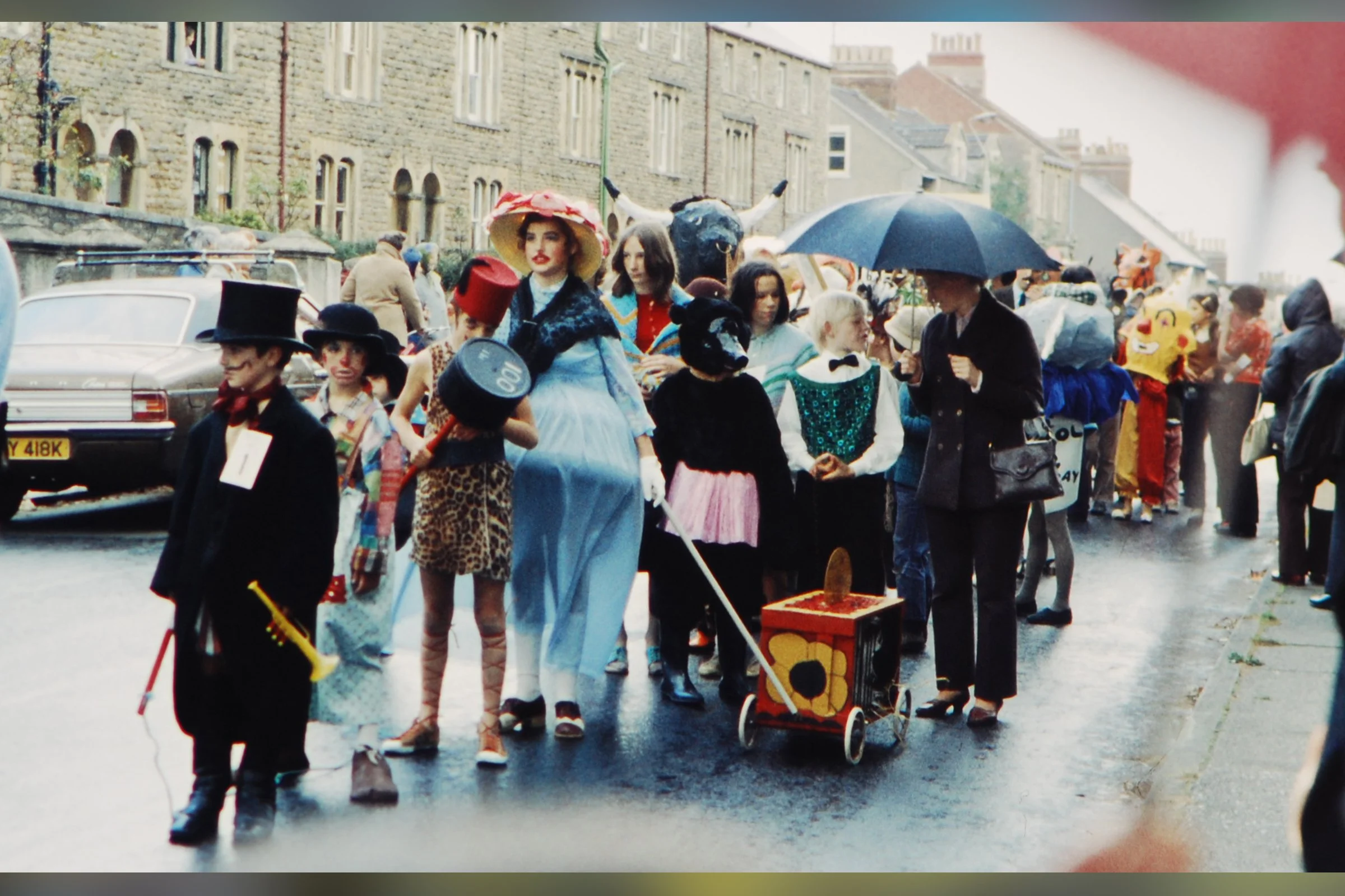 Children during a wet procession