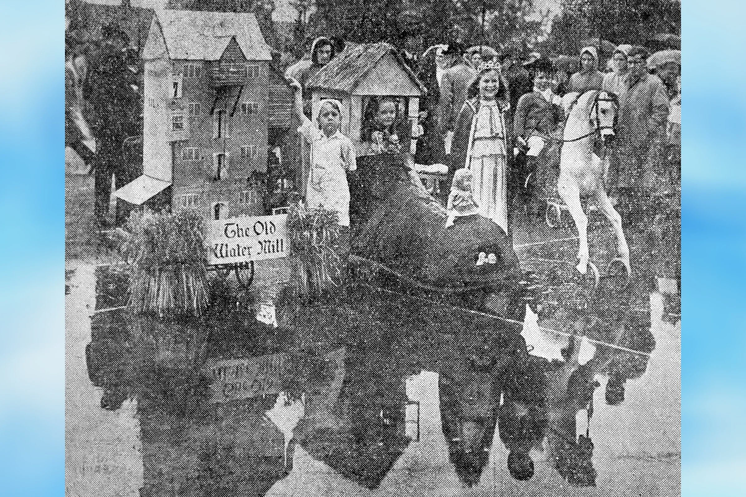 Children's entries on a very wet tennis court in Victoria Park