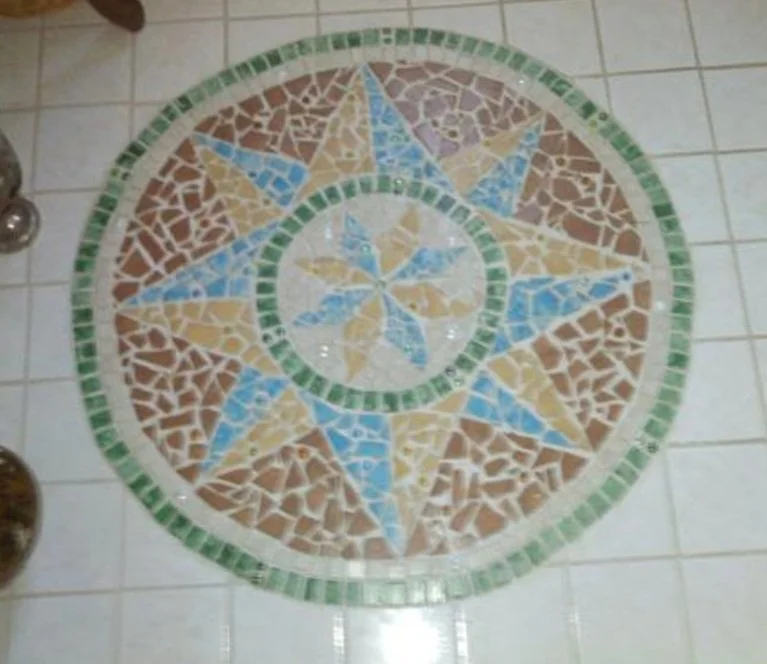 3 foot mosaic inlay in foyer.jpg