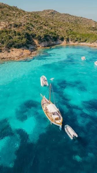 private catamaran cruise Sardinia Yoga Retreat