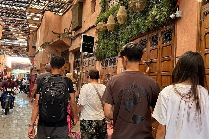  Wandering a narrow alley in the Marrakech medina on a gay travel trip through Morocco 