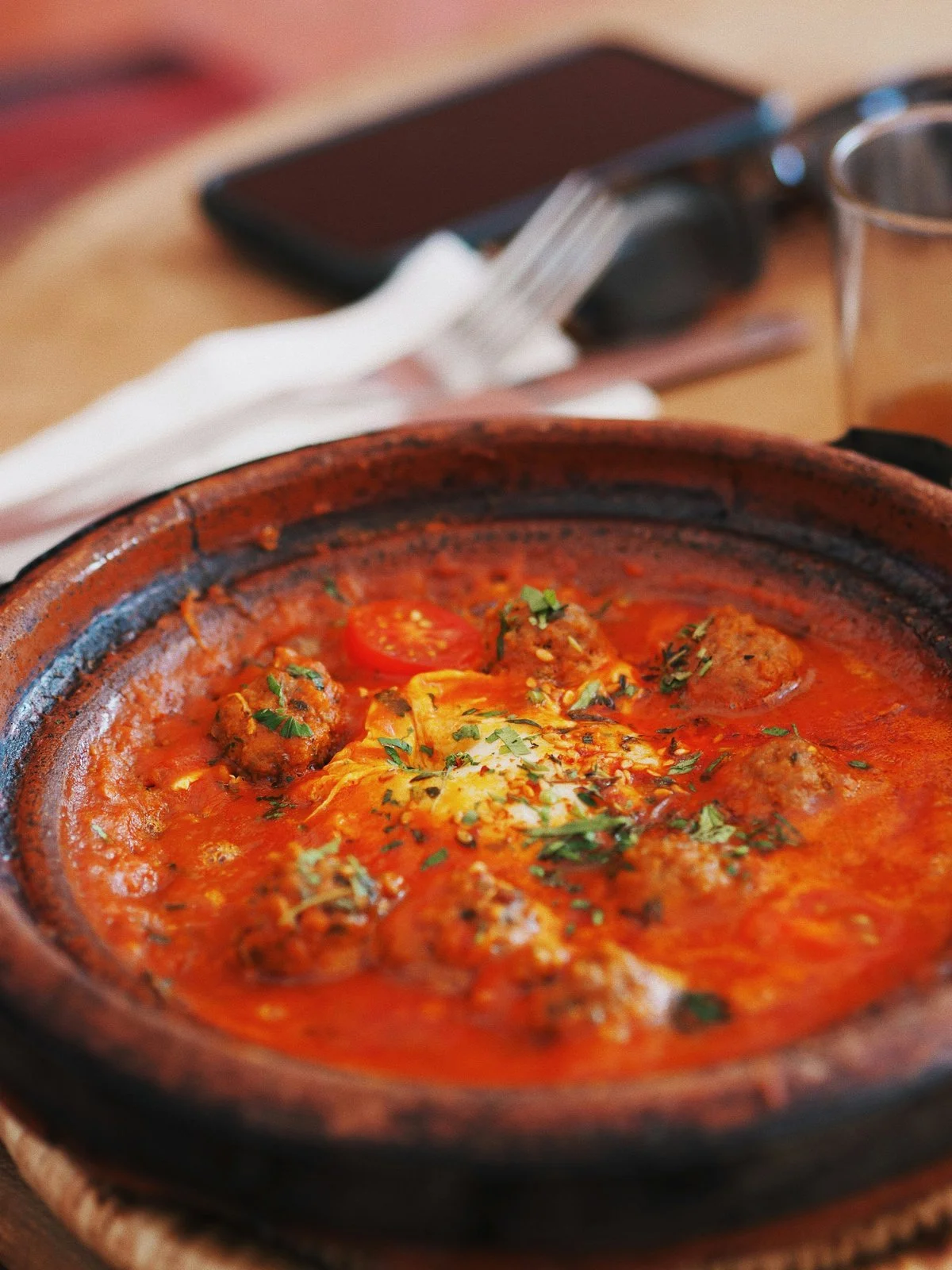  Kefta meatball tagine simmered in tomato sauce, a classic Moroccan dish 