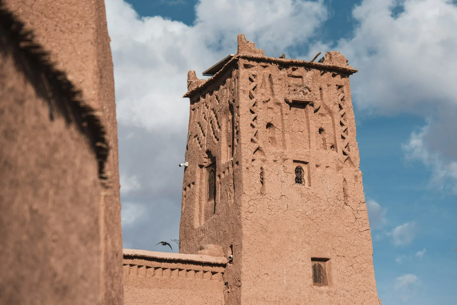  A mud-brick tower of the Ait Ben Haddou kasbah, a UNESCO World Heritage site in Morocco 
