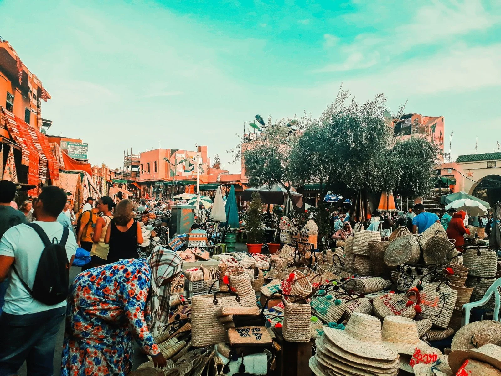  Woven baskets and straw hats for sale at a stall in Jemaa el-Fnaa square, Marrakech 
