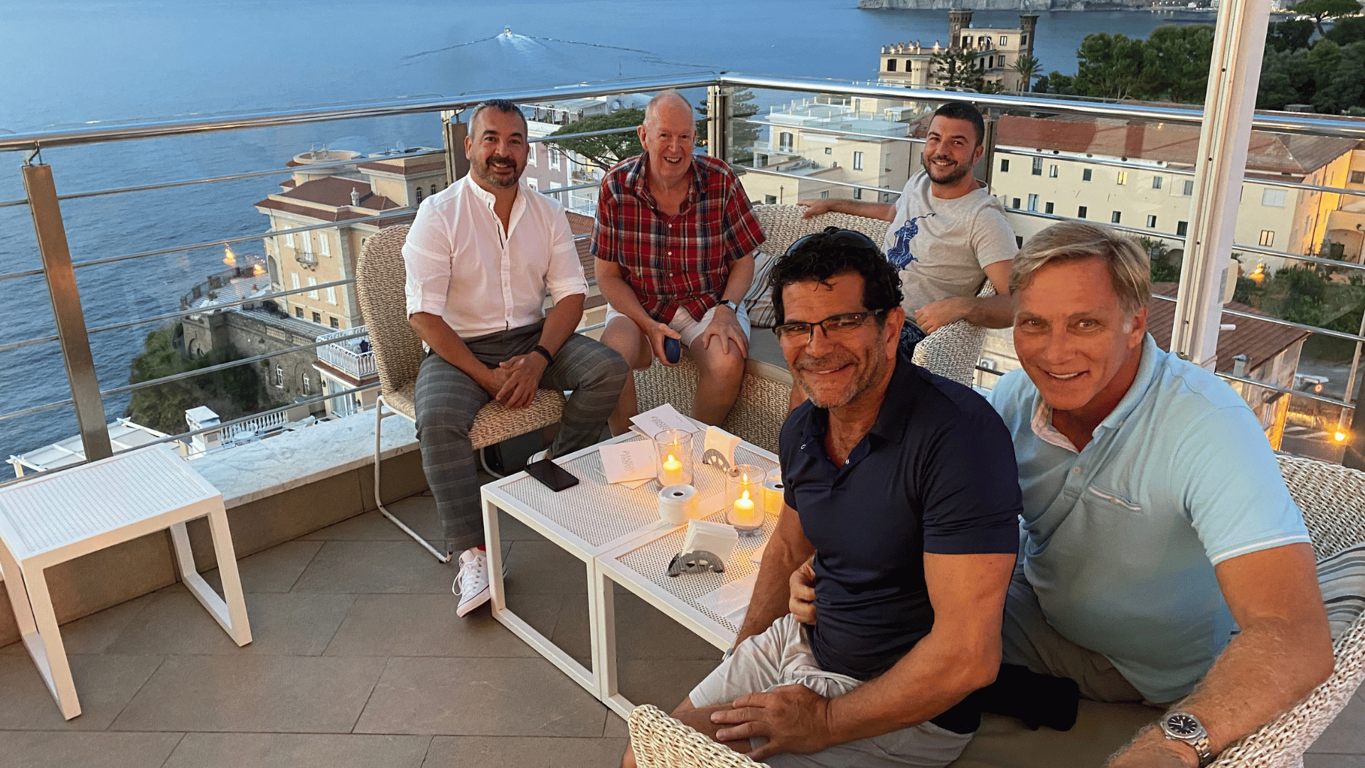 five men on a rooftop in Sicily