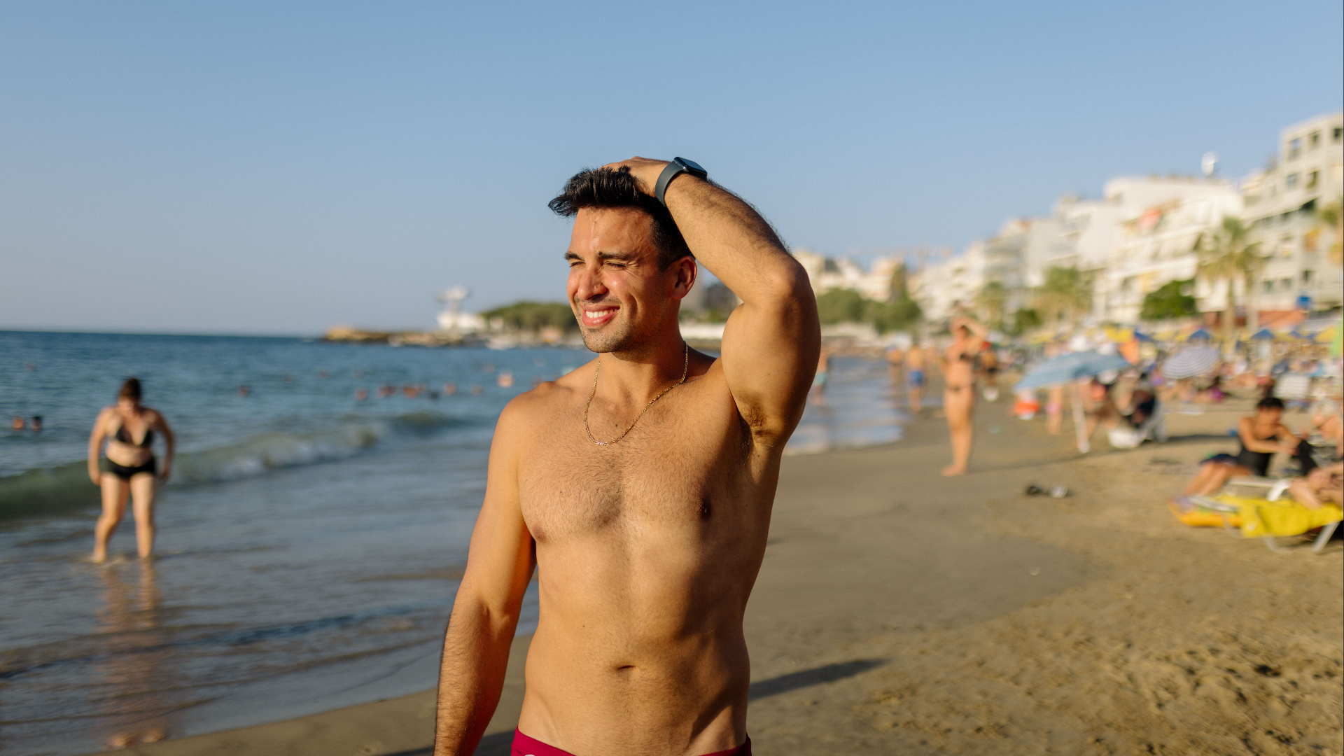 Topless man on an Albanian beach