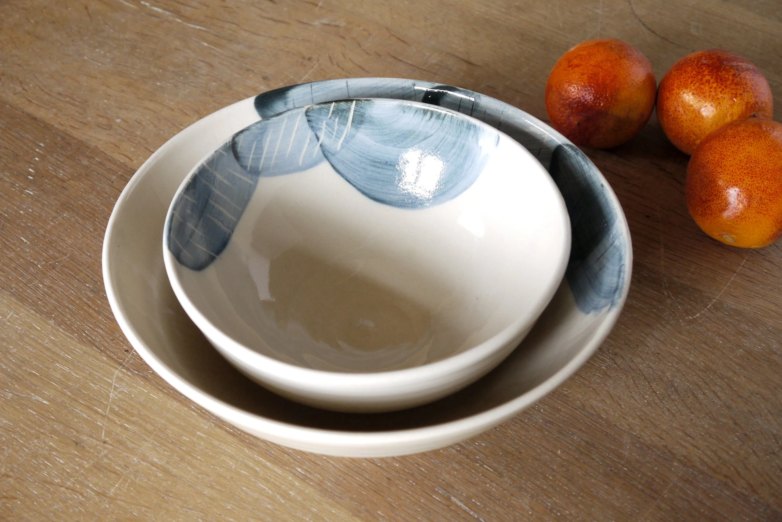 Fields fruit and small salad bowls with oranges.JPG
