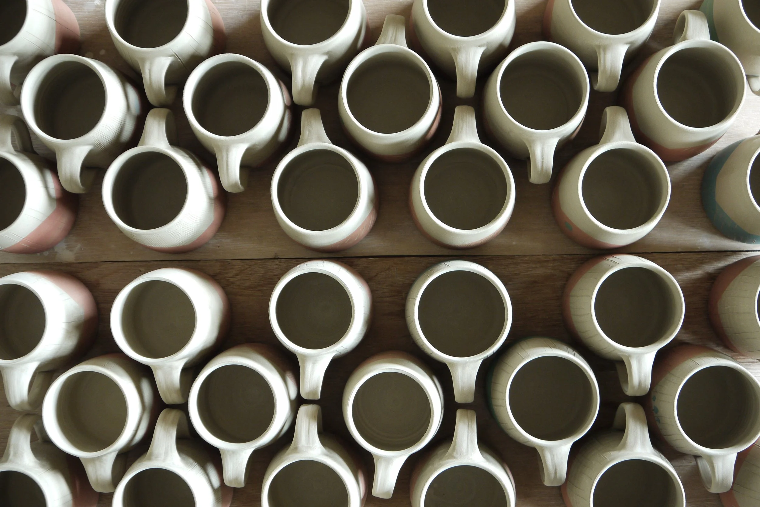 Thrown stoneware mugs.JPG