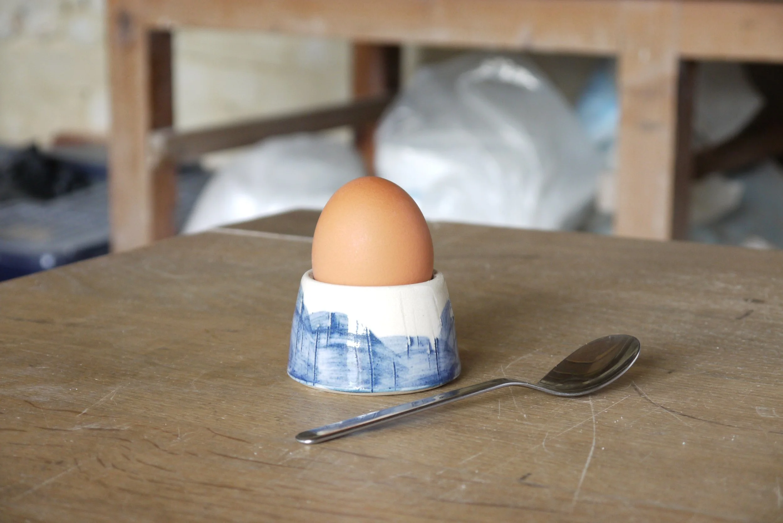 Fields egg cup with egg and teaspoon.JPG