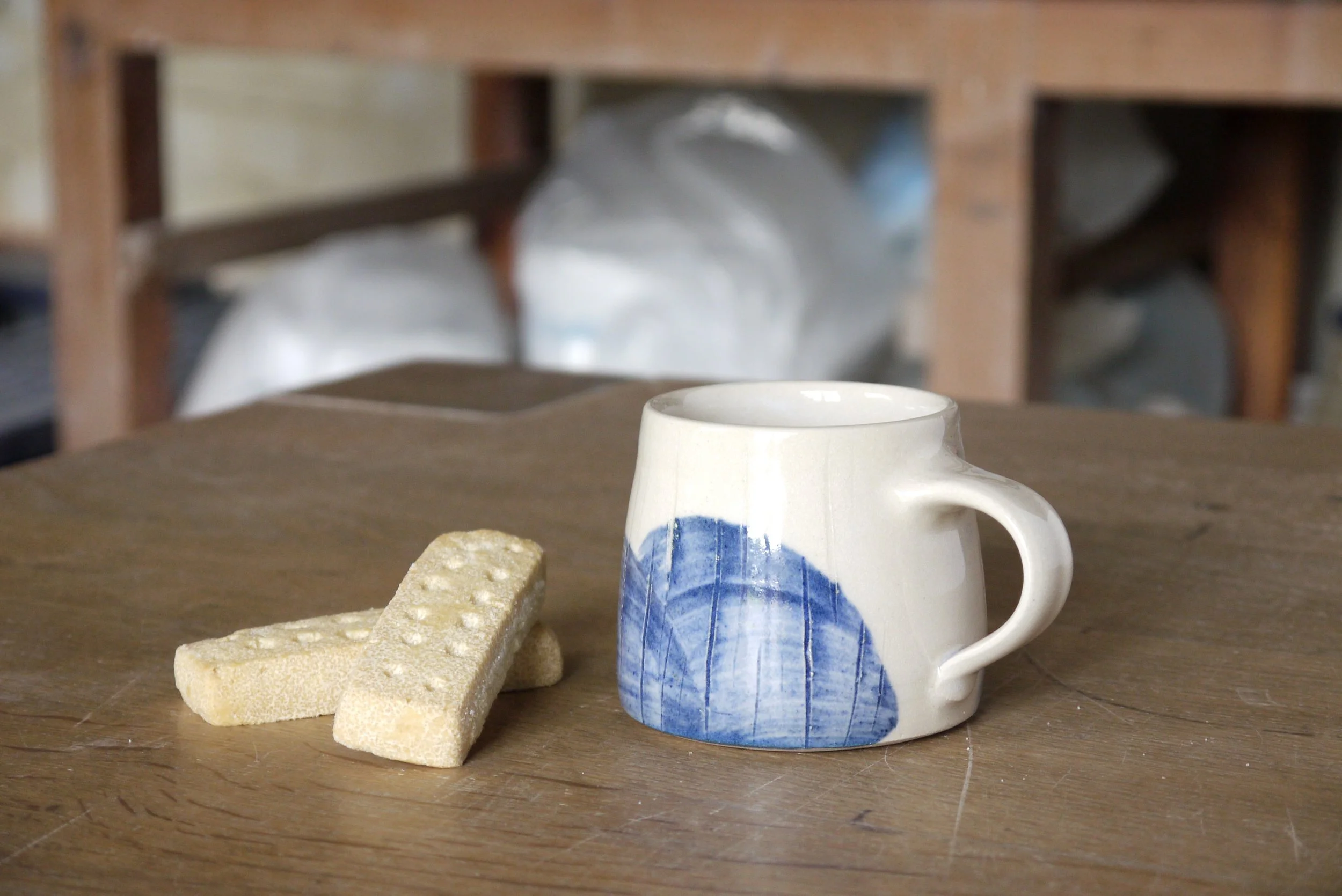Fields espresso mug with biscuits.JPG