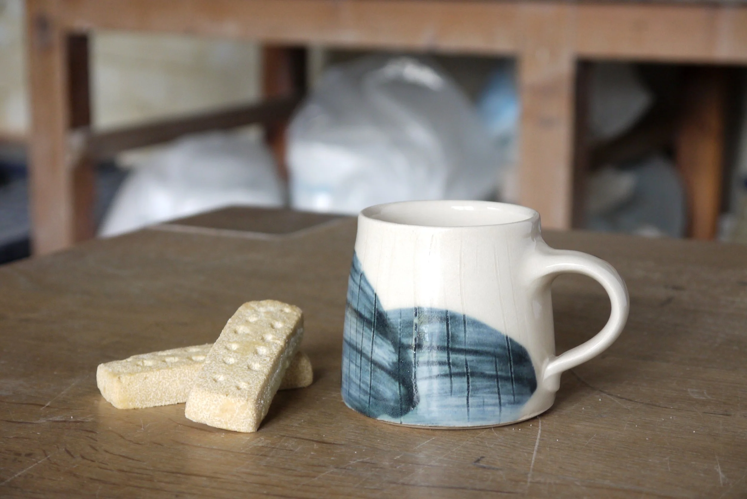 Fields coffee mug with biscuits.JPG