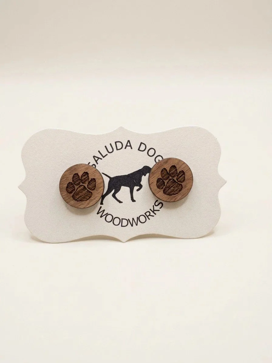 Tiger paw wood earrings on a Saluda Dog Woodworks card