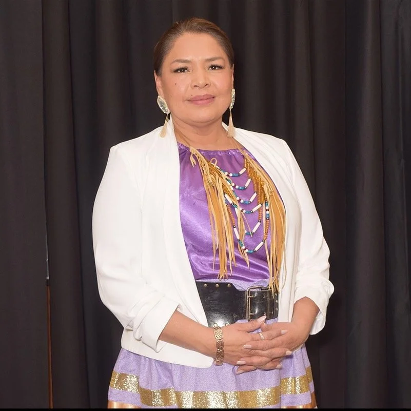 Women wearing purple and white