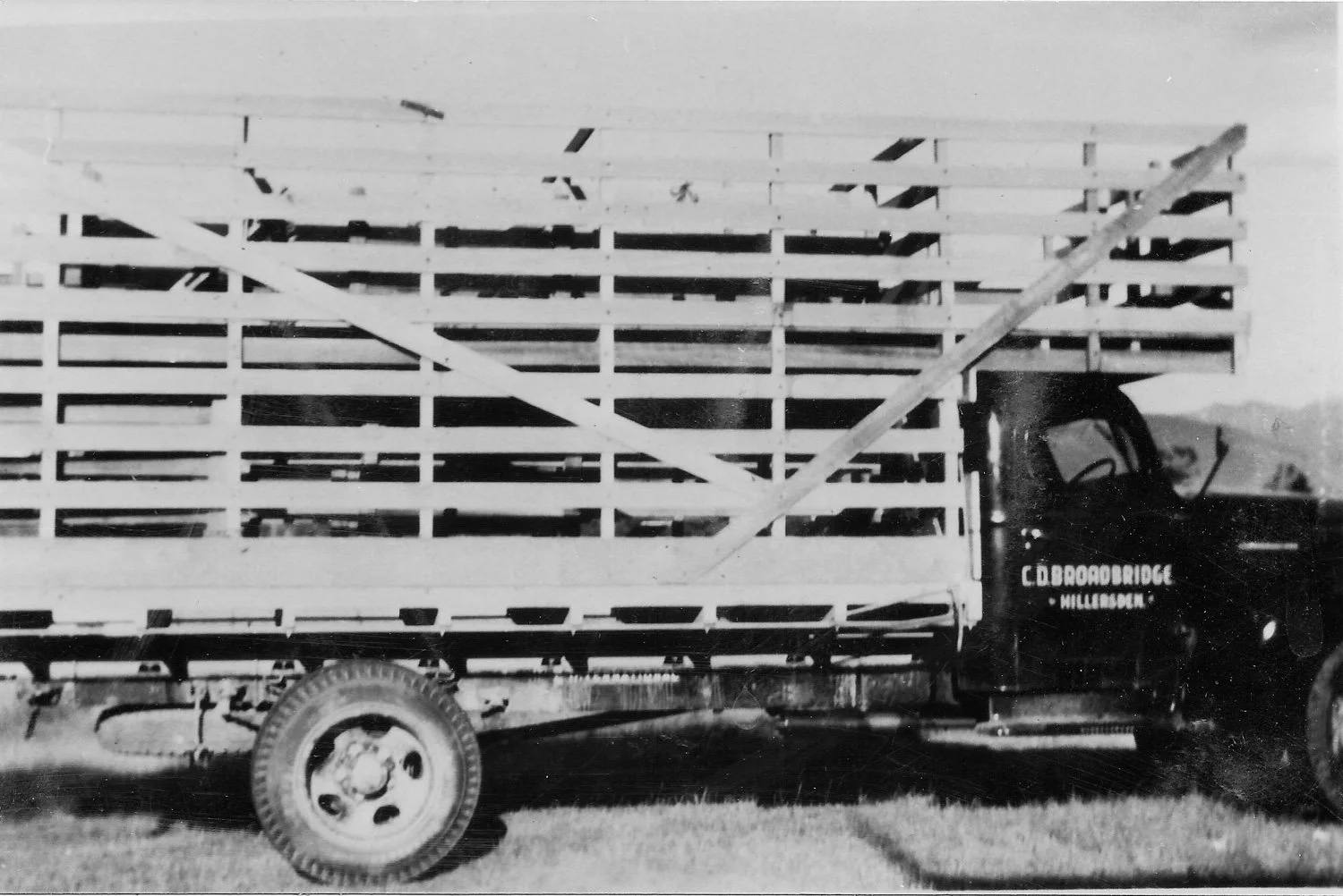 An International with the company's first wooden stock crate.