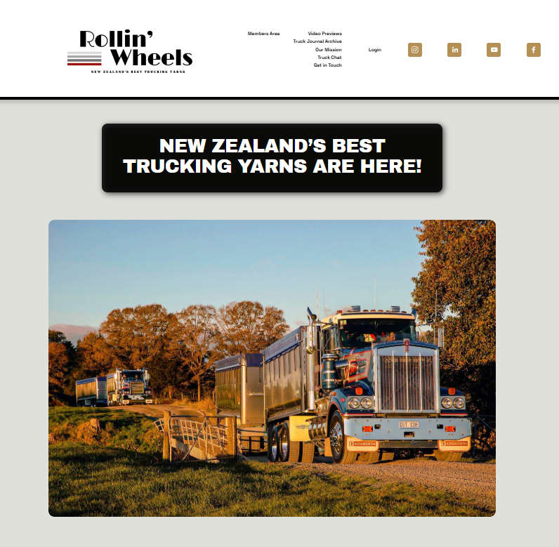 A screen shot of a website with the logo naand bottons across the top, a large black box with texy and a picyrue of two trucks on a gravel road, the first crossing a bridge. There is grass in the foreground and trees in the background