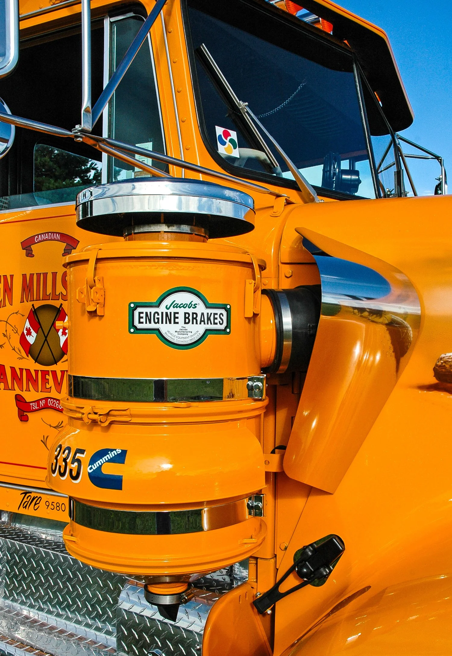 A yellow truck showing the air cleaner