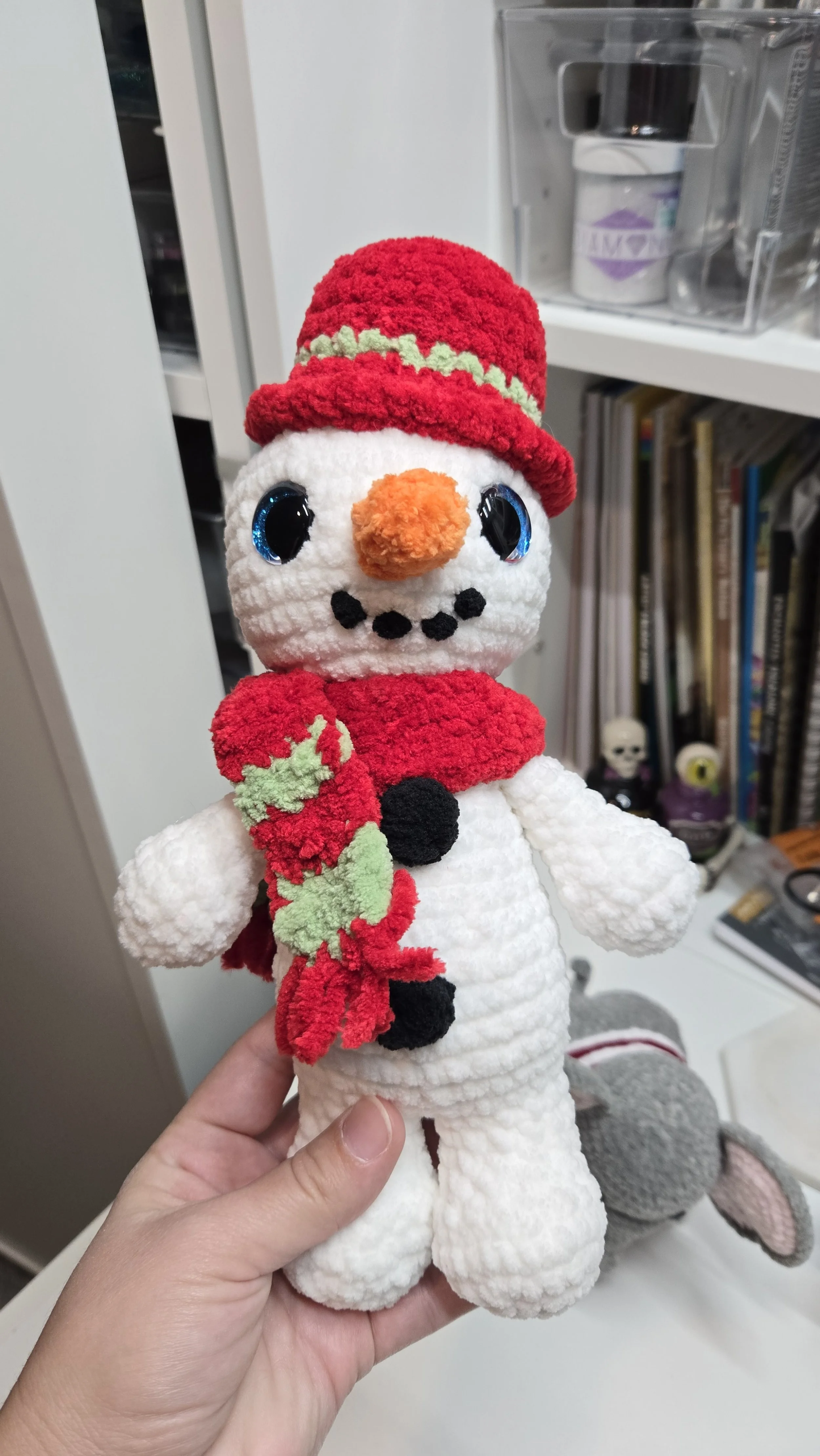 Snowman crochet pattern by Crochet Grove. The face was modified.