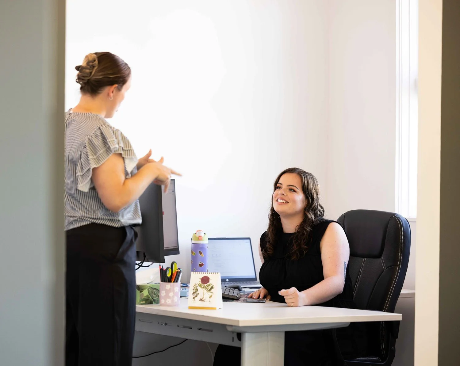 Mrs Tradie admin assistant helping a client