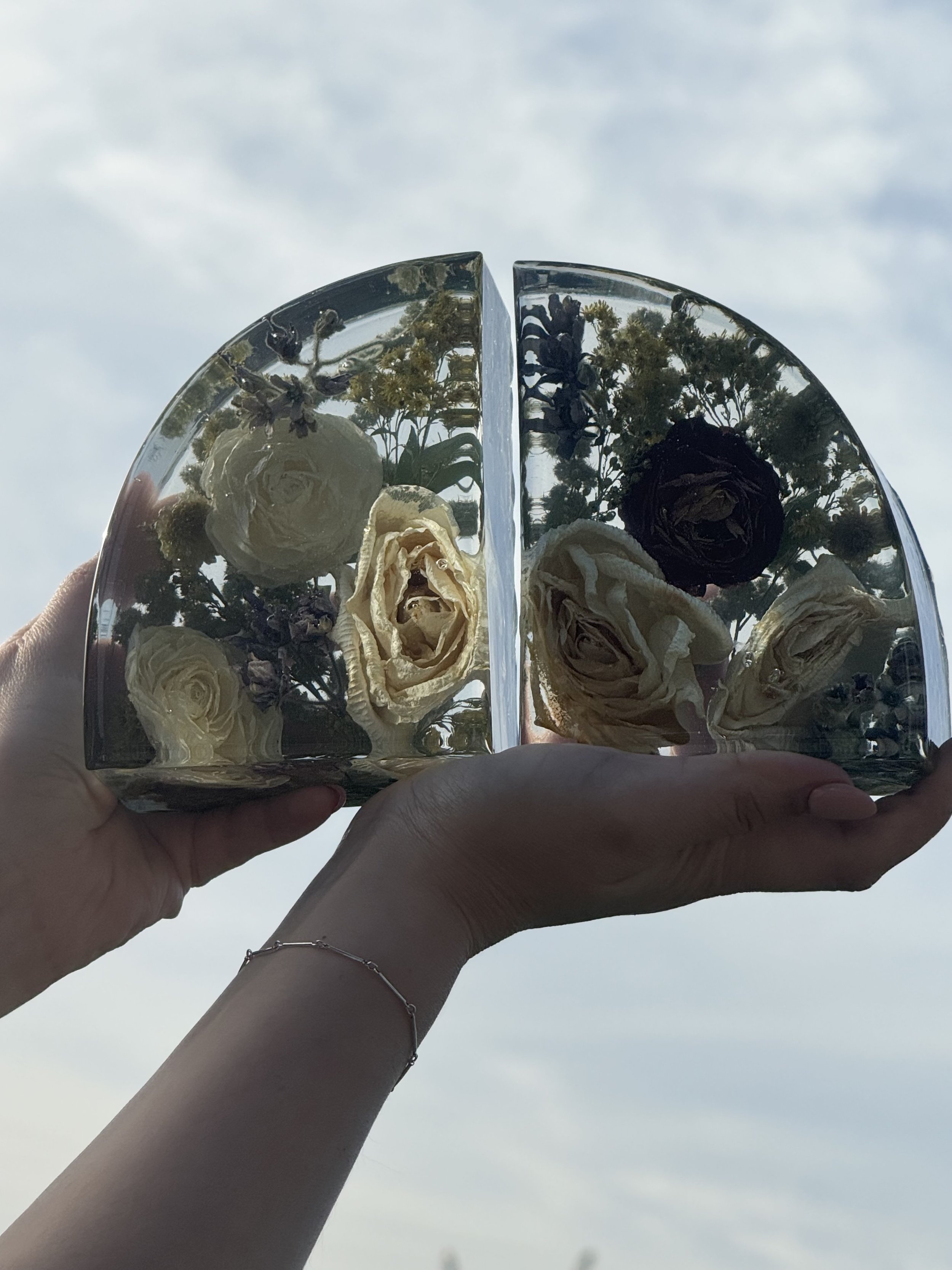 Resin bookends with a variety of preserved flowers