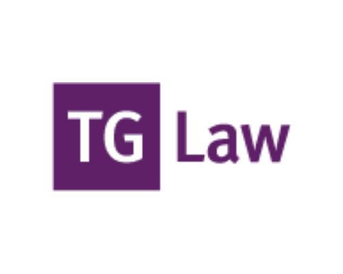 Logo with purple square containing white letters 'TG' and the word 'Law' in purple