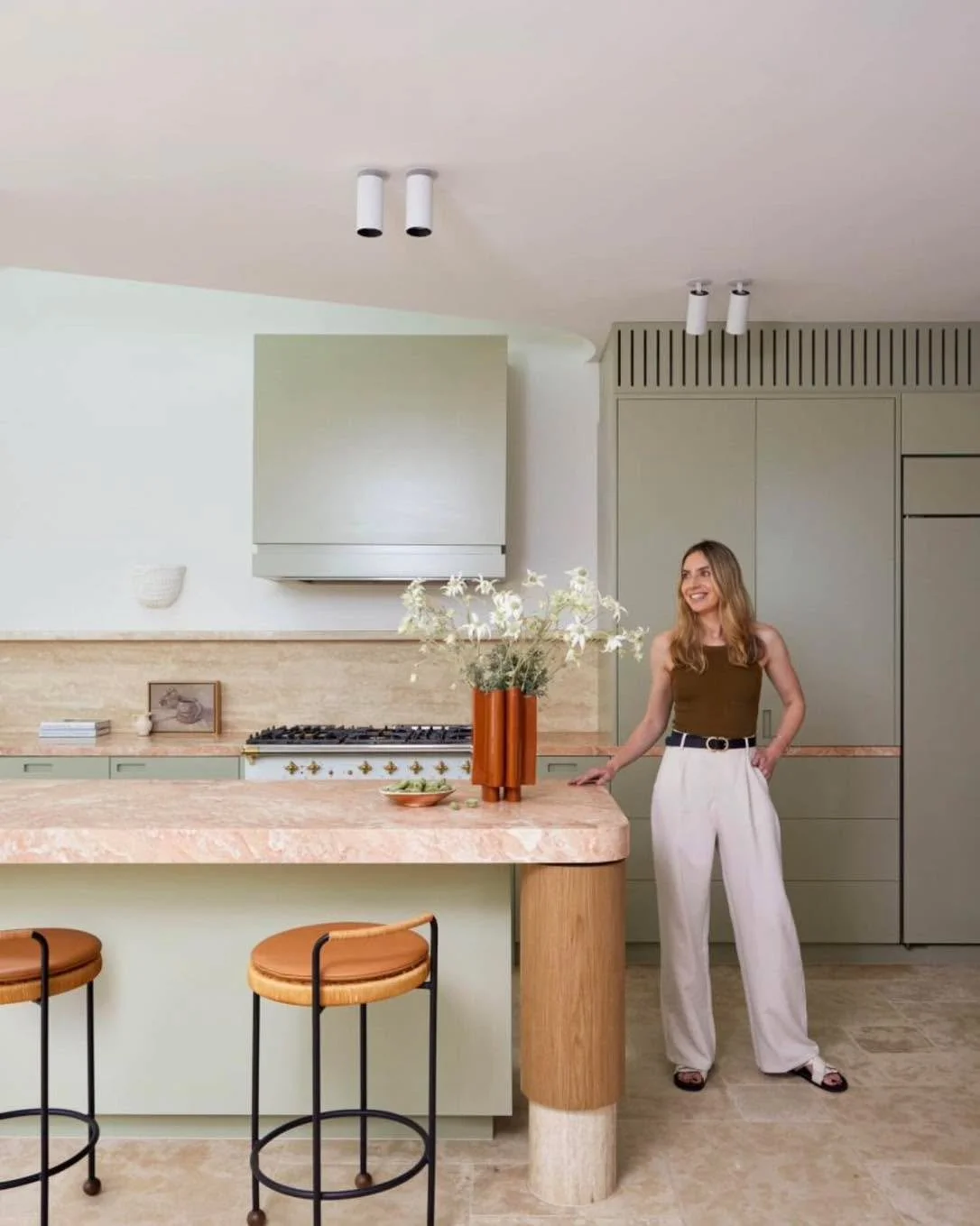 A kitchen by @studio.parker that feels as timeless as it is tranquil.
⁠
Set within a lovingly restored weatherboard cottage in Balmain, this space was designed to capture the calm of its leafy surroundings. The soft sage joinery draws from the native