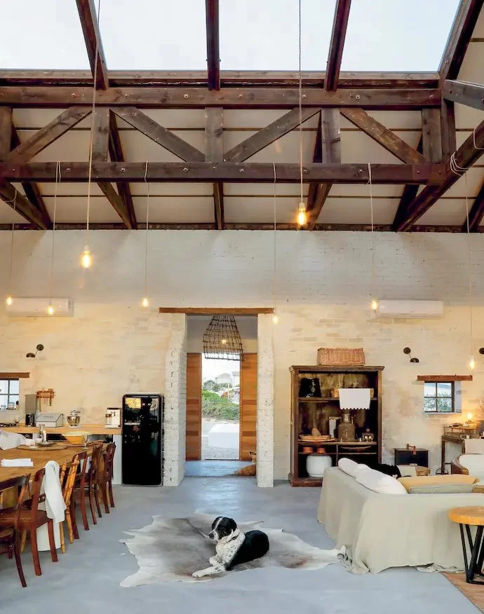 This understated oceanfront home on South Africa&rsquo;s coast reveals beauty in simplicity.

Interiors curated by homeowner Evi are &ldquo;curated, not decorated&rdquo; - a thoughtful blend of salvaged pieces, aged textiles and objects with story, l