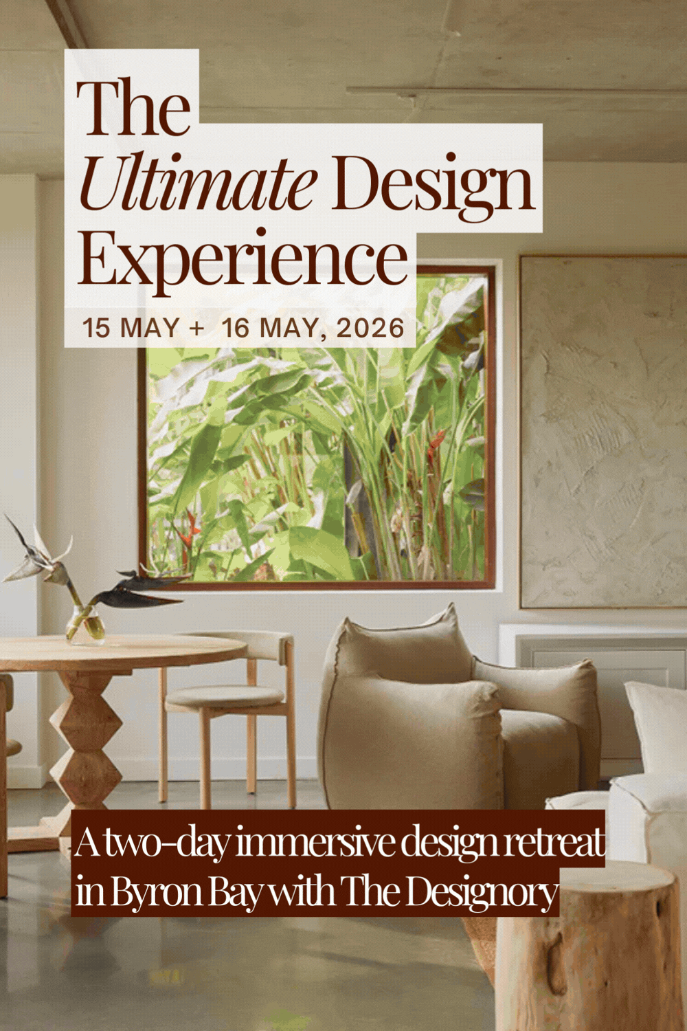 Poster advertising 'The Ultimate Design Experience' event happening on May 15-16, 2026. The event features a two-day immersive design retreat in Byron Bay with The Designory. The background shows a cozy interior space with beige chairs, a wooden table, and a large window with greenery outside.