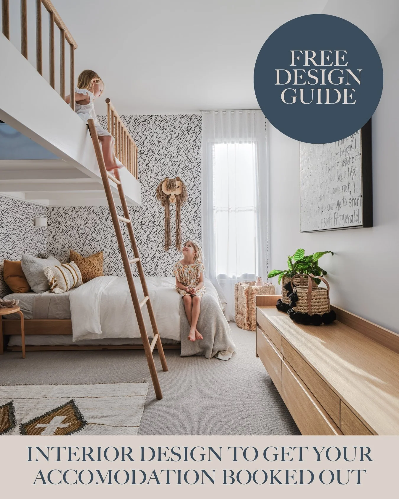 A cozy children's bedroom with a girl sitting on the bed, a wallpapered wall with a decorative wall hanging, a wooden ladder leading to a loft, and natural light coming through sheer curtains.