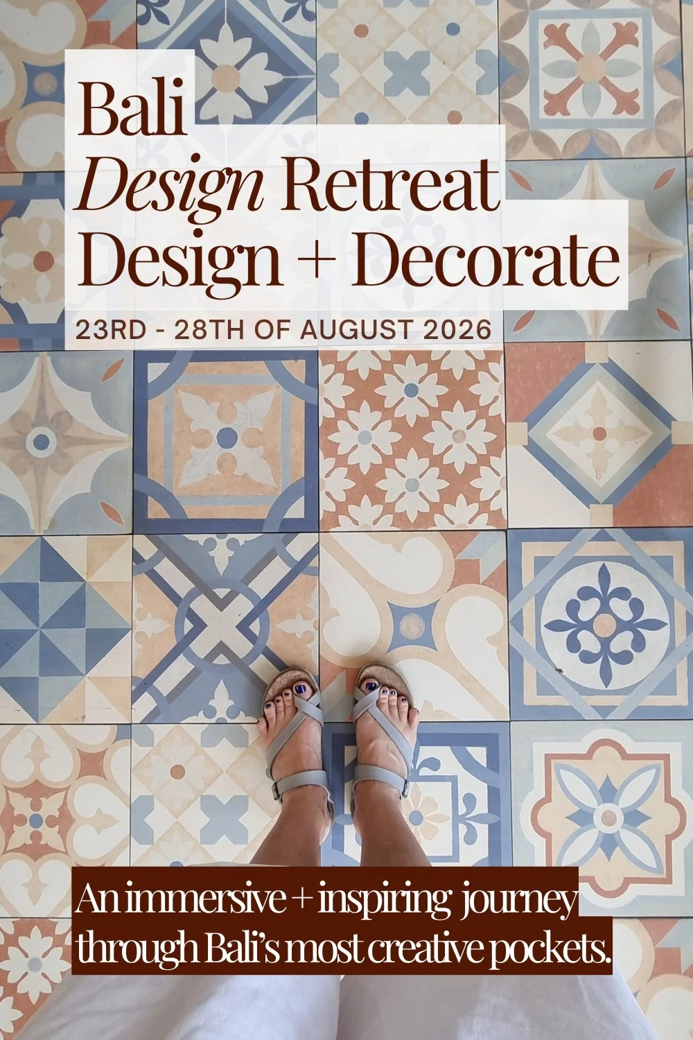 A person wearing sandals standing on a floor with colorful, patterned tiles in Bali. Overlaid text promotes a Bali Design Retreat from August 23rd to 28th, 2026, focusing on design and decoration, emphasizing an immersive journey through Bali's creative pockets.