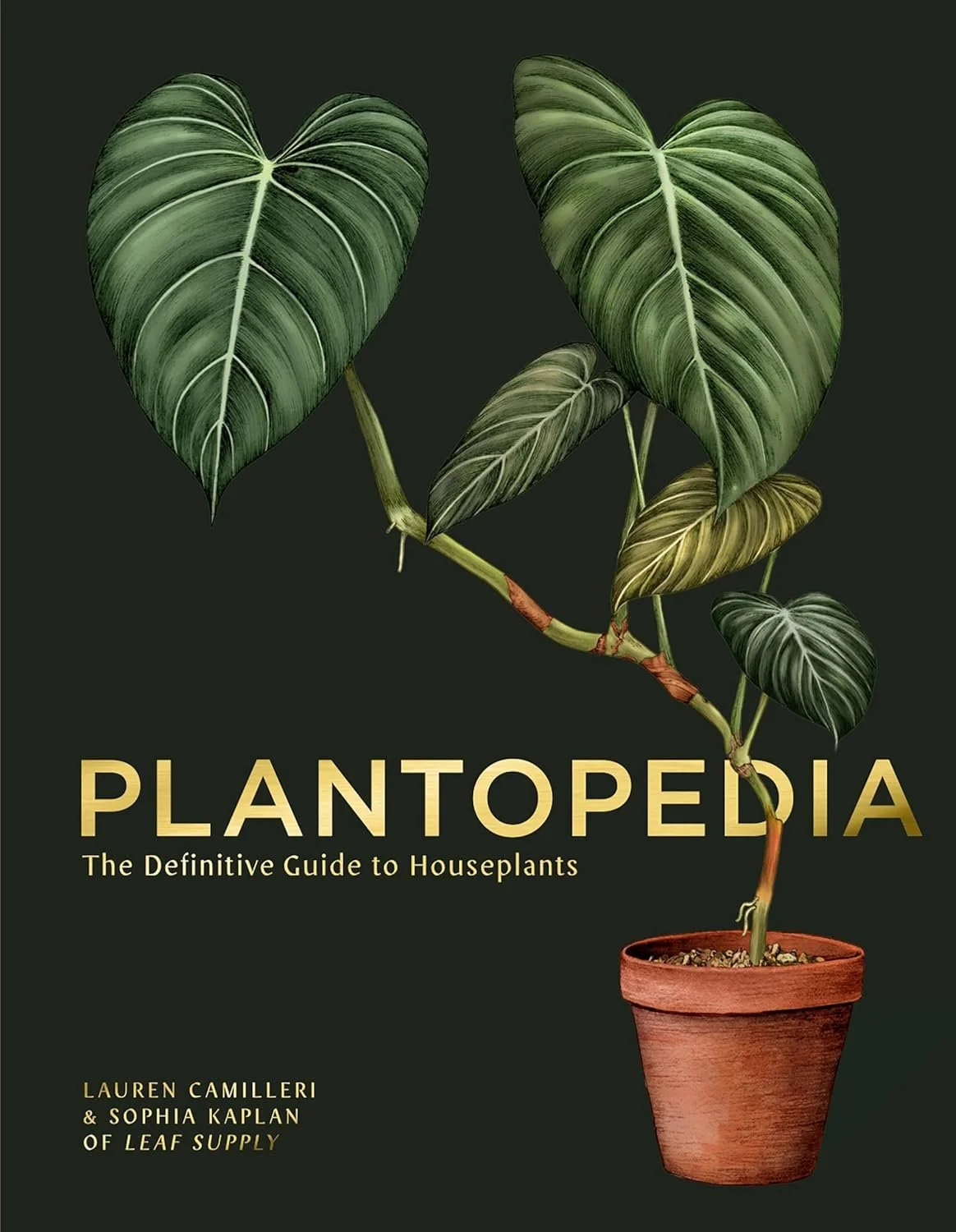 Book cover of 'Plantopedia: The Definitive Guide to Houseplants' by Lauren Camilleri and Sophia Kaplan, featuring a potted plant with large green leaves against a dark background.