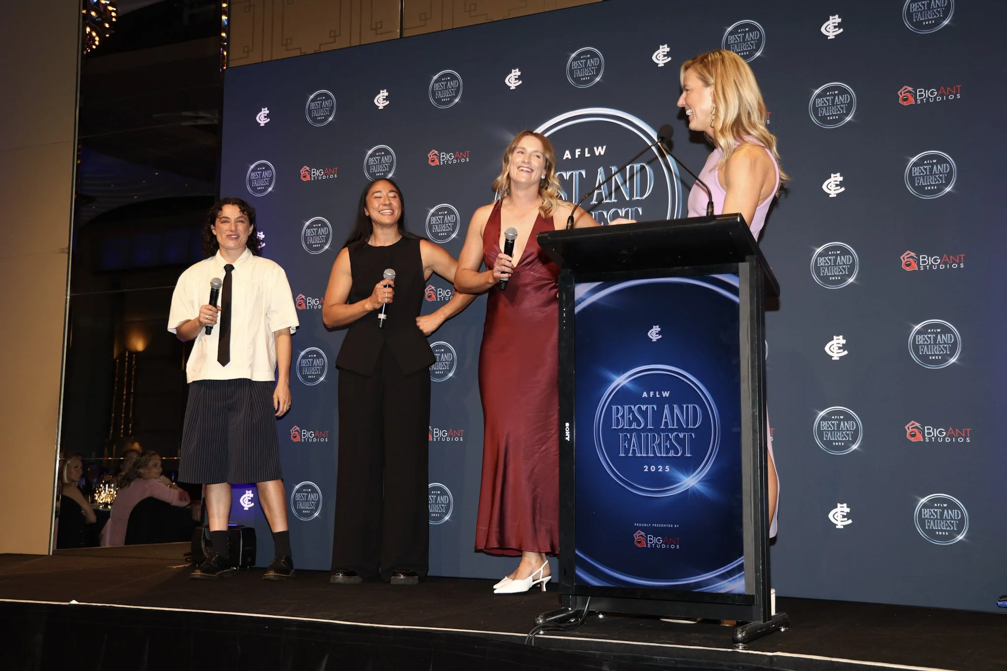 Sarah Ashmore interviewing an athlete panel as MC